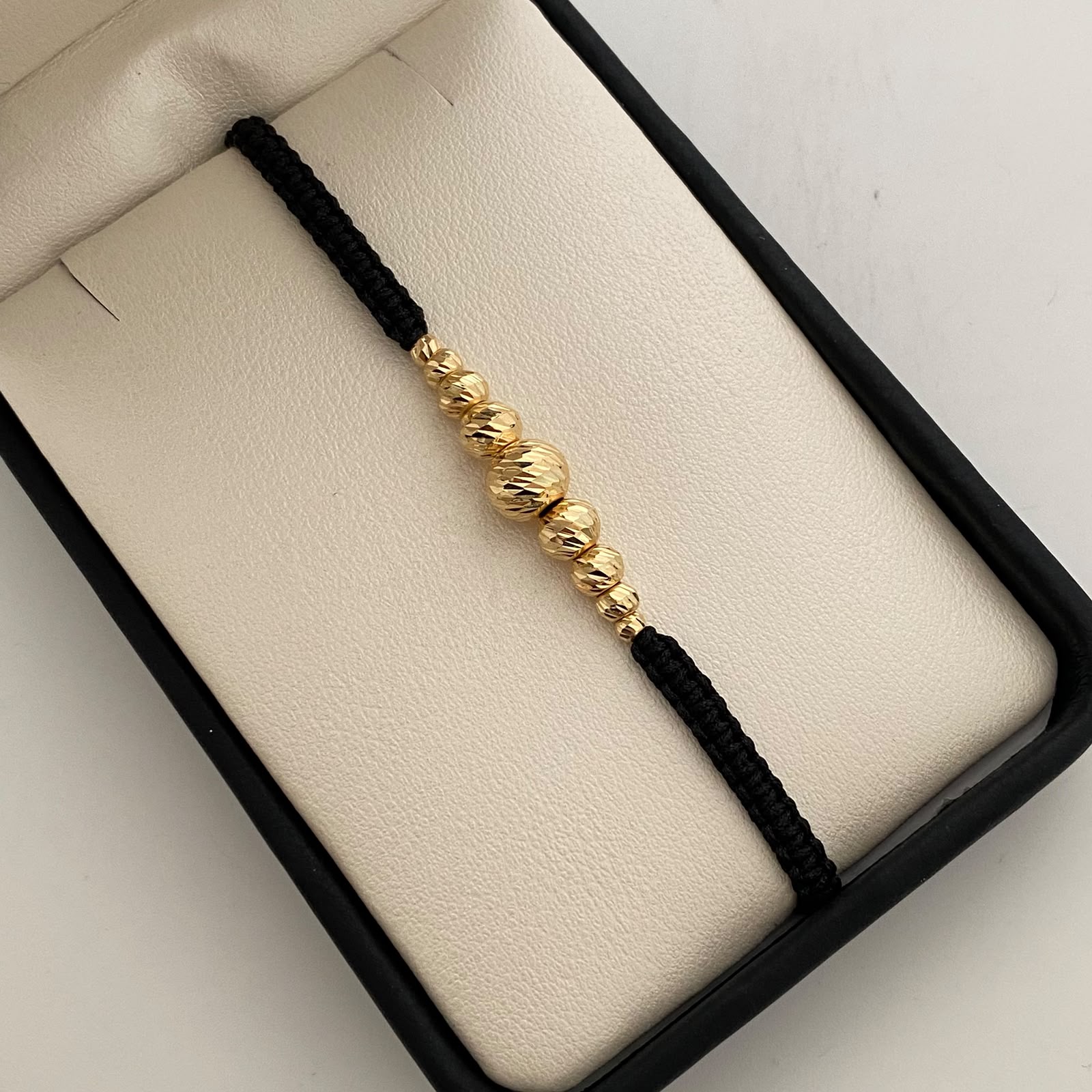 Pulsera tejida Bolas Diamantadas 8,6,5,4,3 mm negro Oro amarillo 18k 0,85 Gr