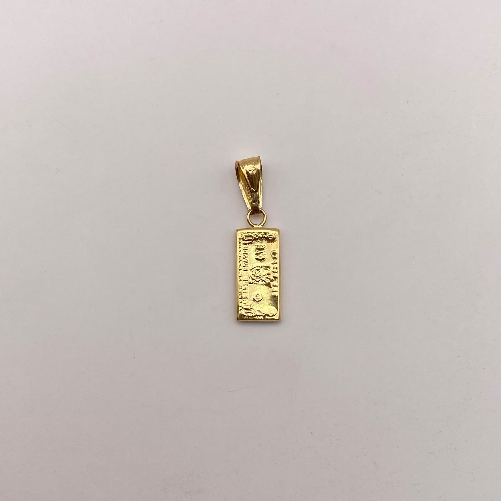 Dije dolar Oro amarillo 18k 0,65 Gr / 6,56 mm / 2,5 Cm