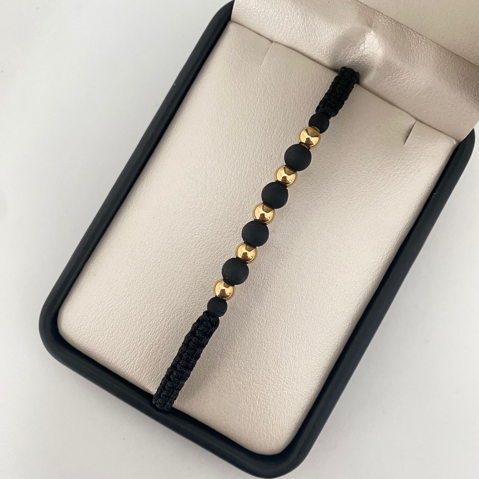 Pulsera tejida balines lisos #5 y neoprenos negros Oro amarillo 18k 0,70 Gr