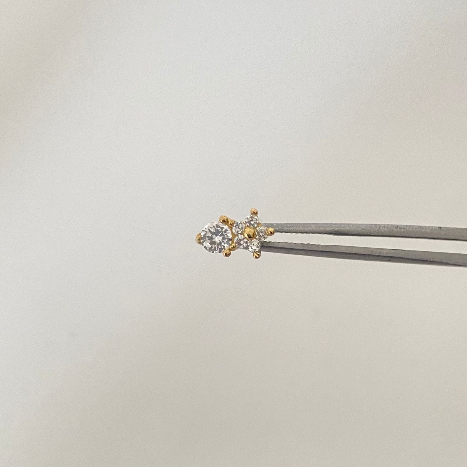 Piercing circon y estrella ( joya ) Oro amarillo 18k 0,8 Gr