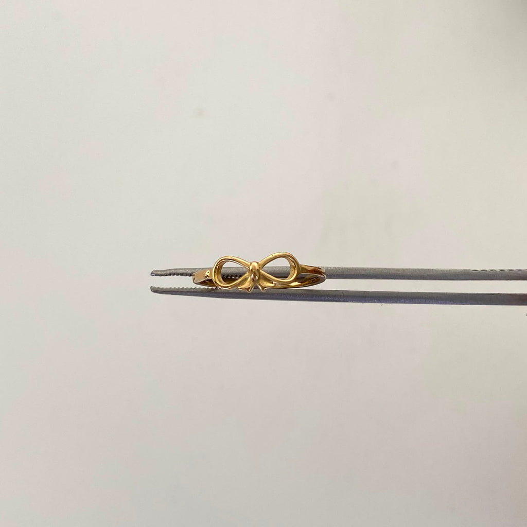 Anillo Moño Oro amarillo 18k / Talla 6 / 1,25 Gr / 1,5 mm