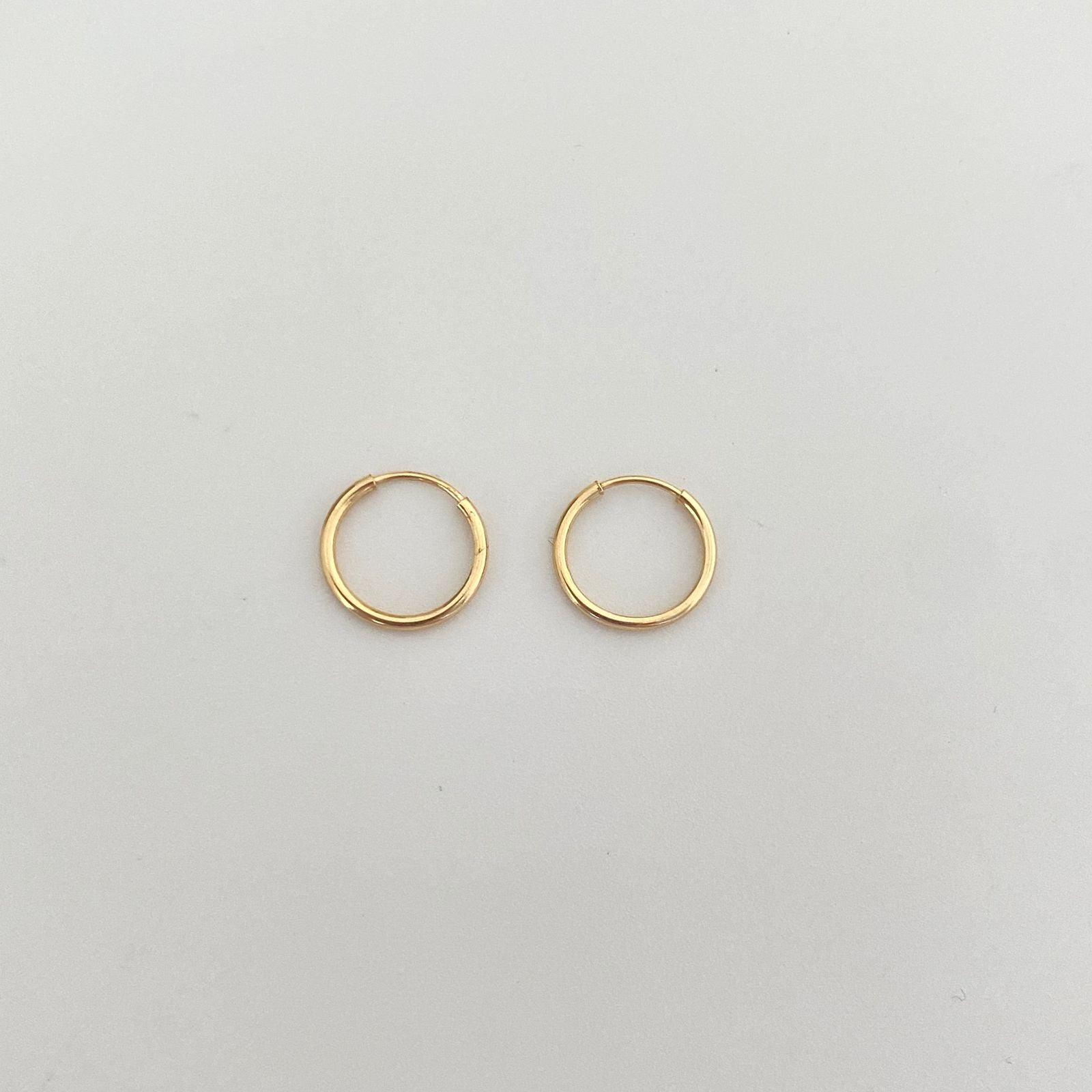 Candonga impedible lisa Oro amarillo 18k 0,50 Gr / 1,0 Cm