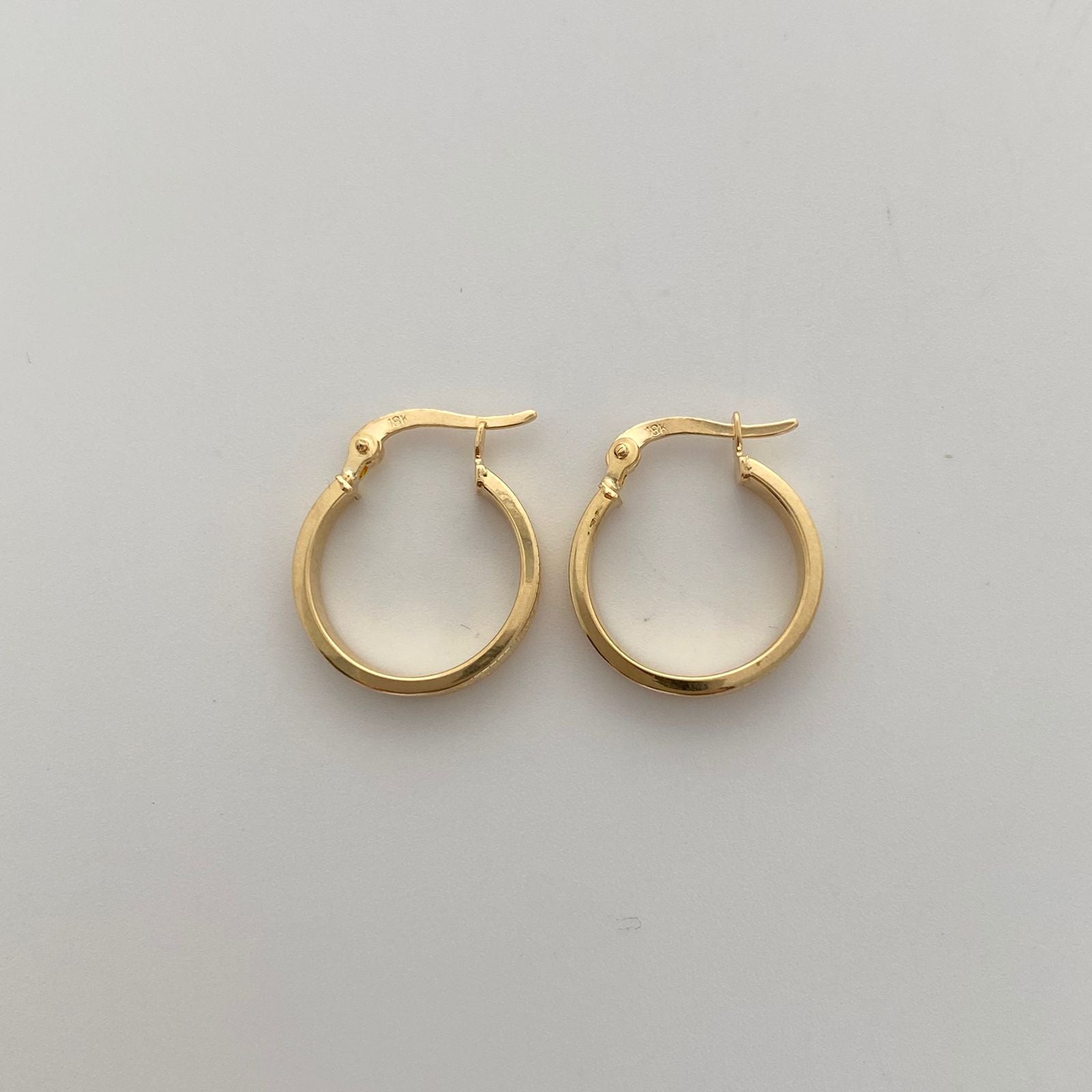 Candonga redonda Vs Oro amarillo 18k 1,7 Gr / 2 Cm
