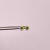 Topos Circulo rededor blanco y centro verde Oro amarillo 18k 0,75 Gr / 5,4 mm