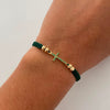 Pulsera tejida Cruz Circones Verde bolas diamantadas 4mm Oro amarillo 18k 0,9 Gr