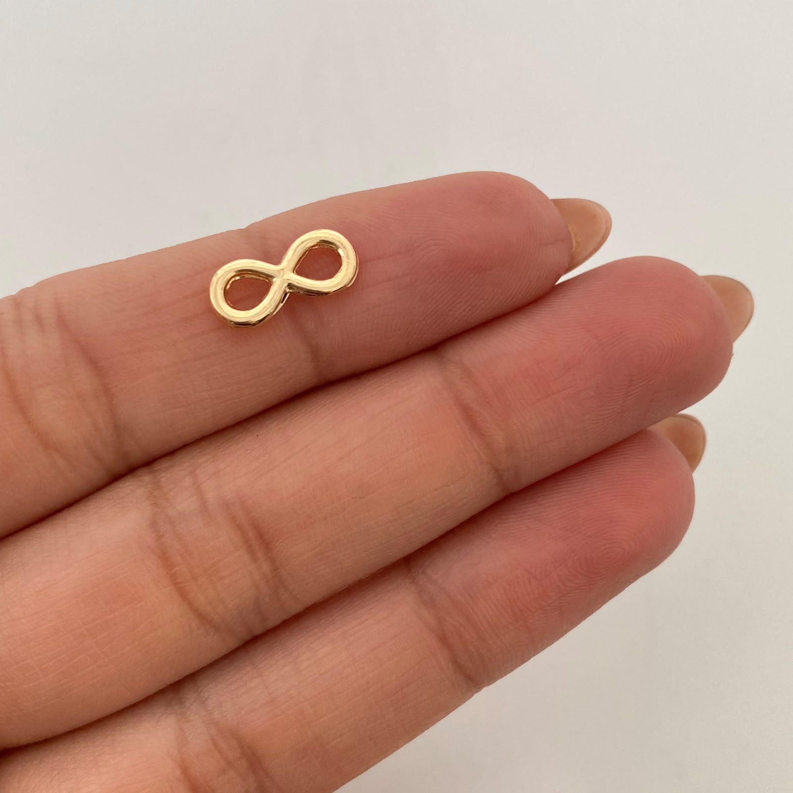 Herraje Infinito Oro amarillo 18k 0,35 Gr / 1,3 Cm