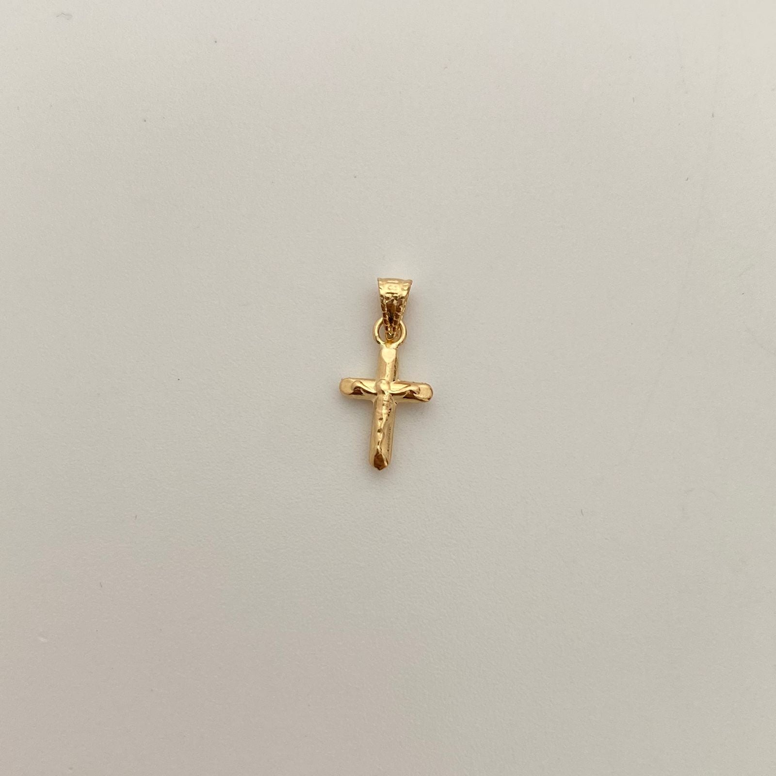 Dije Cristo Oro amarillo 18k 0,25 Gr / 7,4 mm / 1,5 Cm