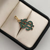 Dije signo de pesos con circones negros y verdes  Oro amarillo 18k 3,1 Gr / 13 mm / 3,6 Cm
