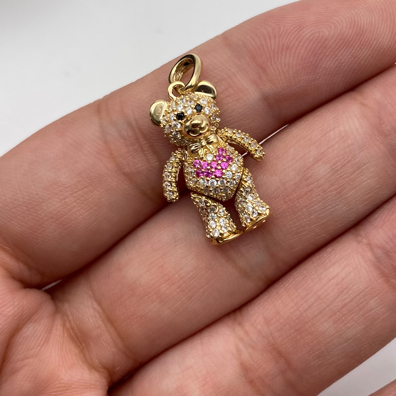 Dije Oso articulado circones blancos corazon fucsia Oro amarillo 18k 4,41 Gr / 13,8 mm / 2,4 Cm