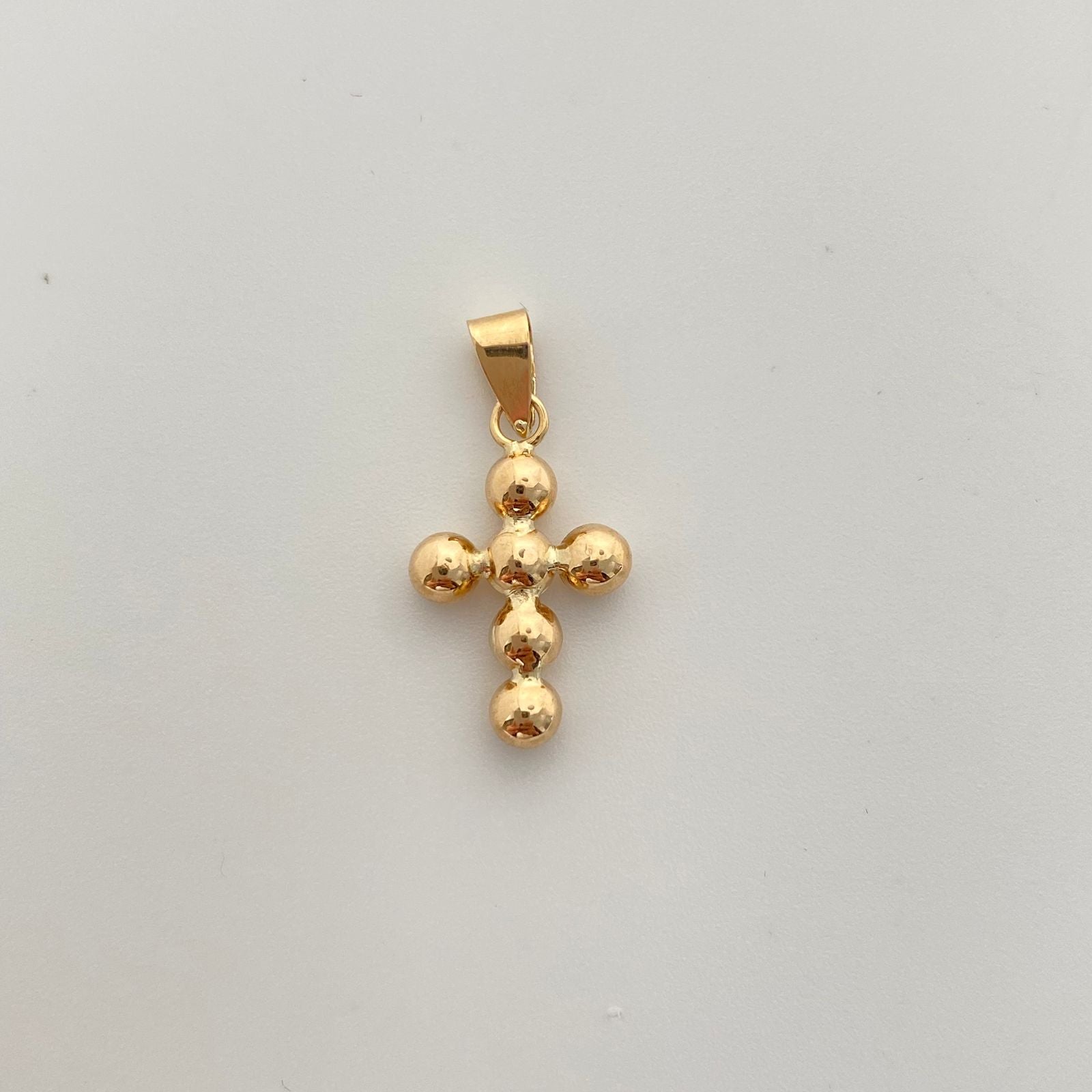 Dije cruz con balines inflados  Oro amarillo 18k 0,8 Gr / 3,7 mm / 2,5 Cm