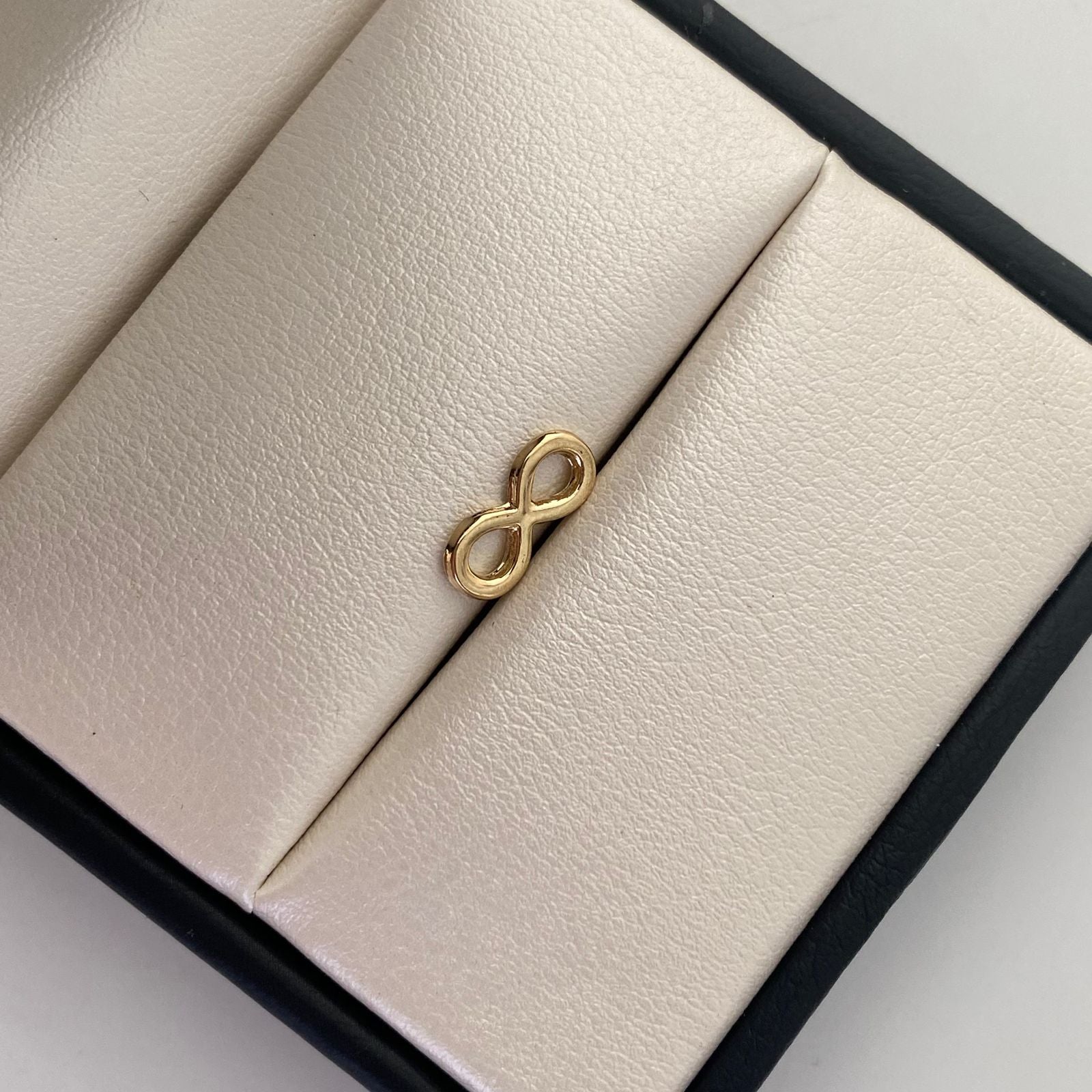 Herraje Infinito Pequeño Oro amarillo 18k 0,35 Gr / 0,5 Cm