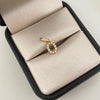 Dije letra O casting Oro amarillo 18k 0,5 Gr / 1,5 Cm