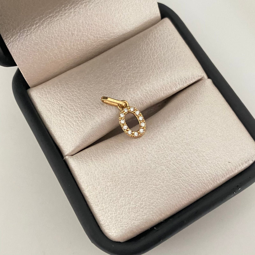 Dije letra O casting Oro amarillo 18k 0,5 Gr / 1,5 Cm