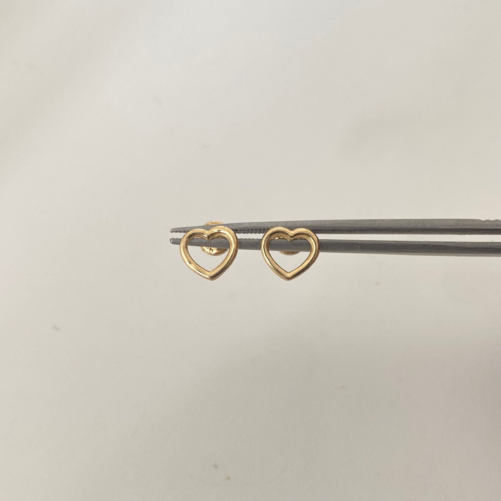 Topos corazon silueta Oro amarillo 18k 0,65 Gr / 8,8 mm