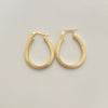 Candonga ovalada rayada  Oro amarillo 18k 2,15 Gr / 2,5 Cm