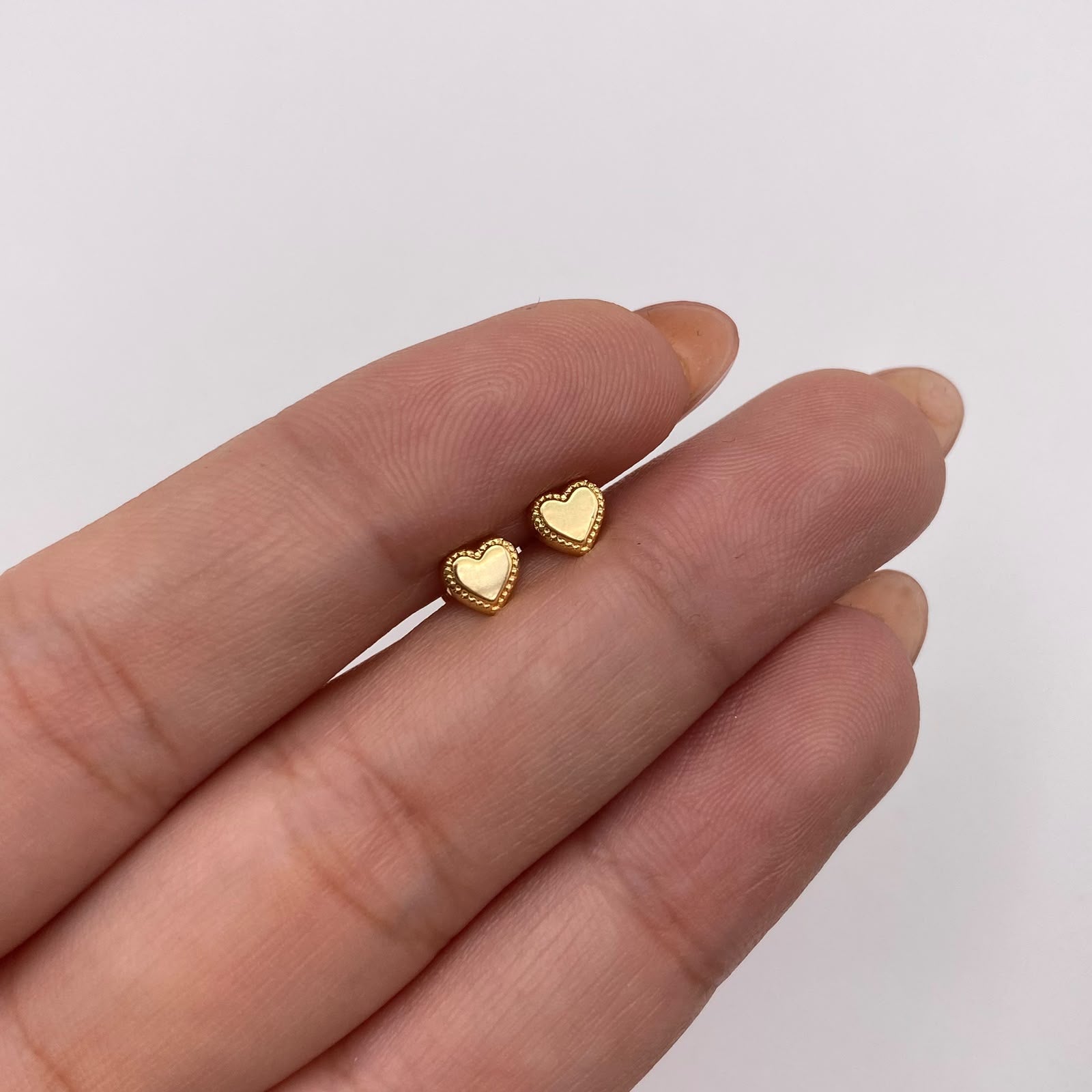 Topos Corazon centro liso Oro amarillo 18k 0,55 Gr / 5,1 mm