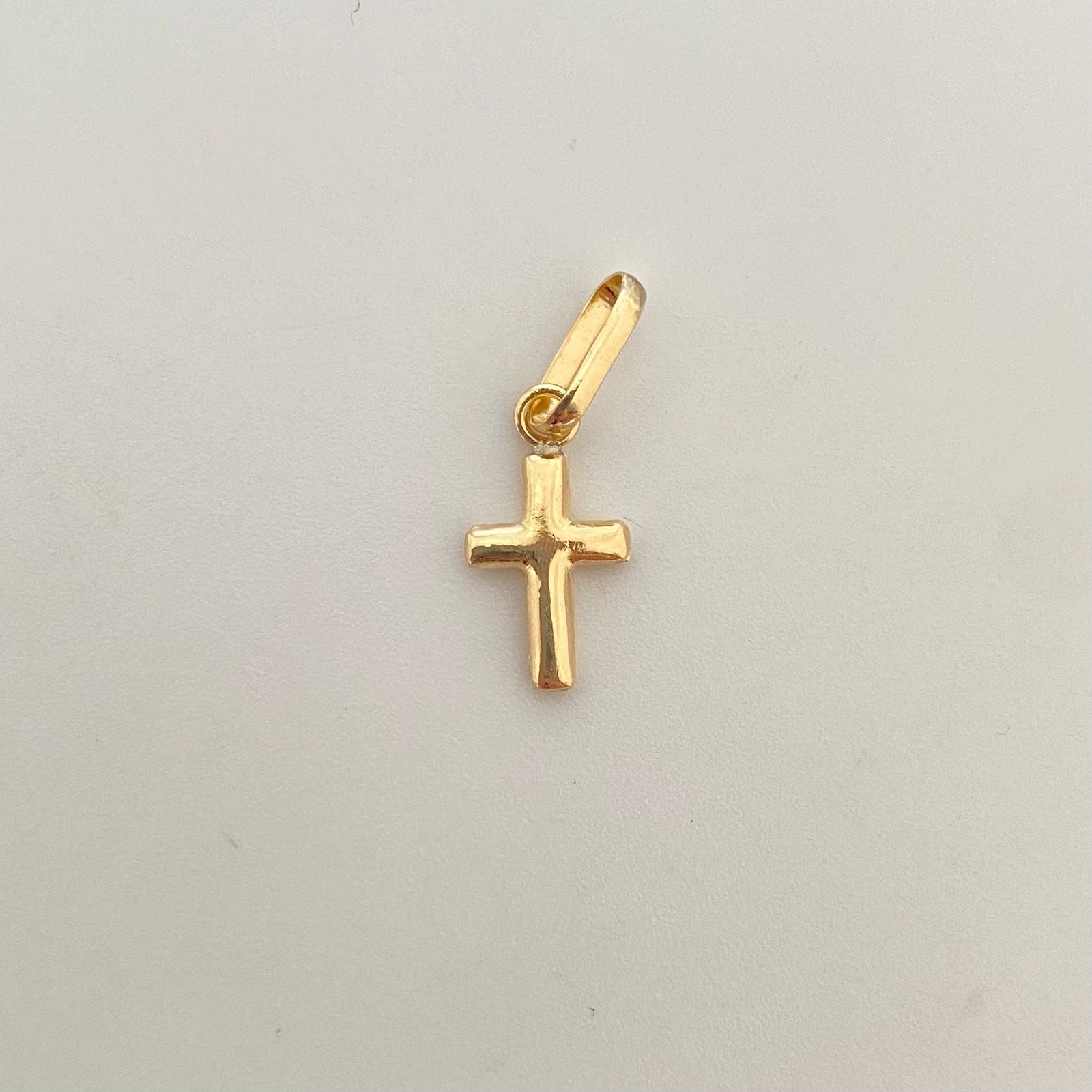 Dije mini cruz lisa Oro amarillo 18k 0,5 Gr / 2,2 Cm
