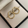Candonga entorchada  Oro amarillo 18k 0,95 Gr / 1,5 Cm