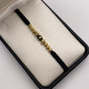 Pulsera tejida Bolas diamantadas 6mm y 5mm con neoro 3 rayas  Oro amarillo 18k 0,75 Gr