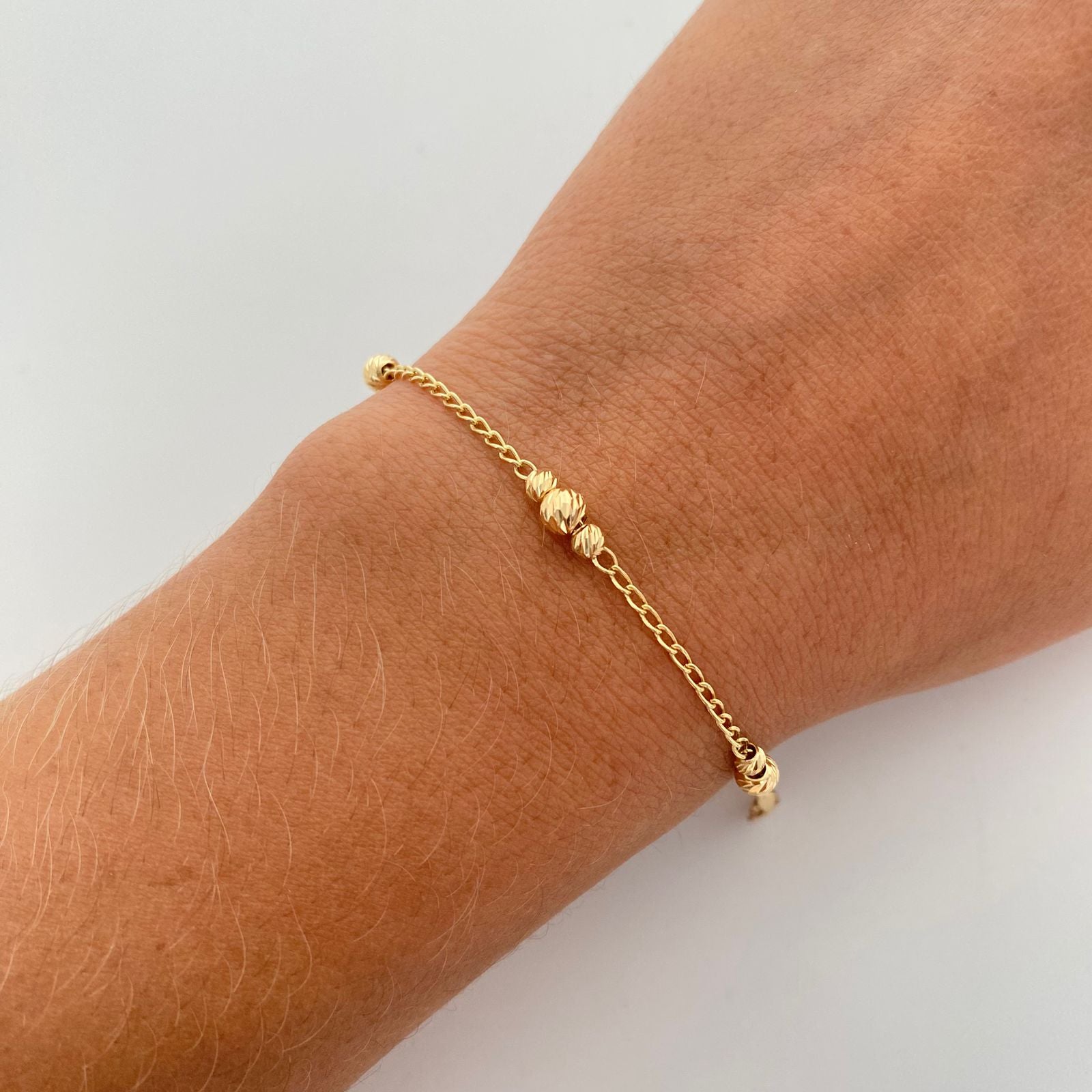 Pulso con balines diamantados 4mm y 3mm  Oro amarillo 18k +1 / 2,50 Gr / 18 cm Broche 0,40