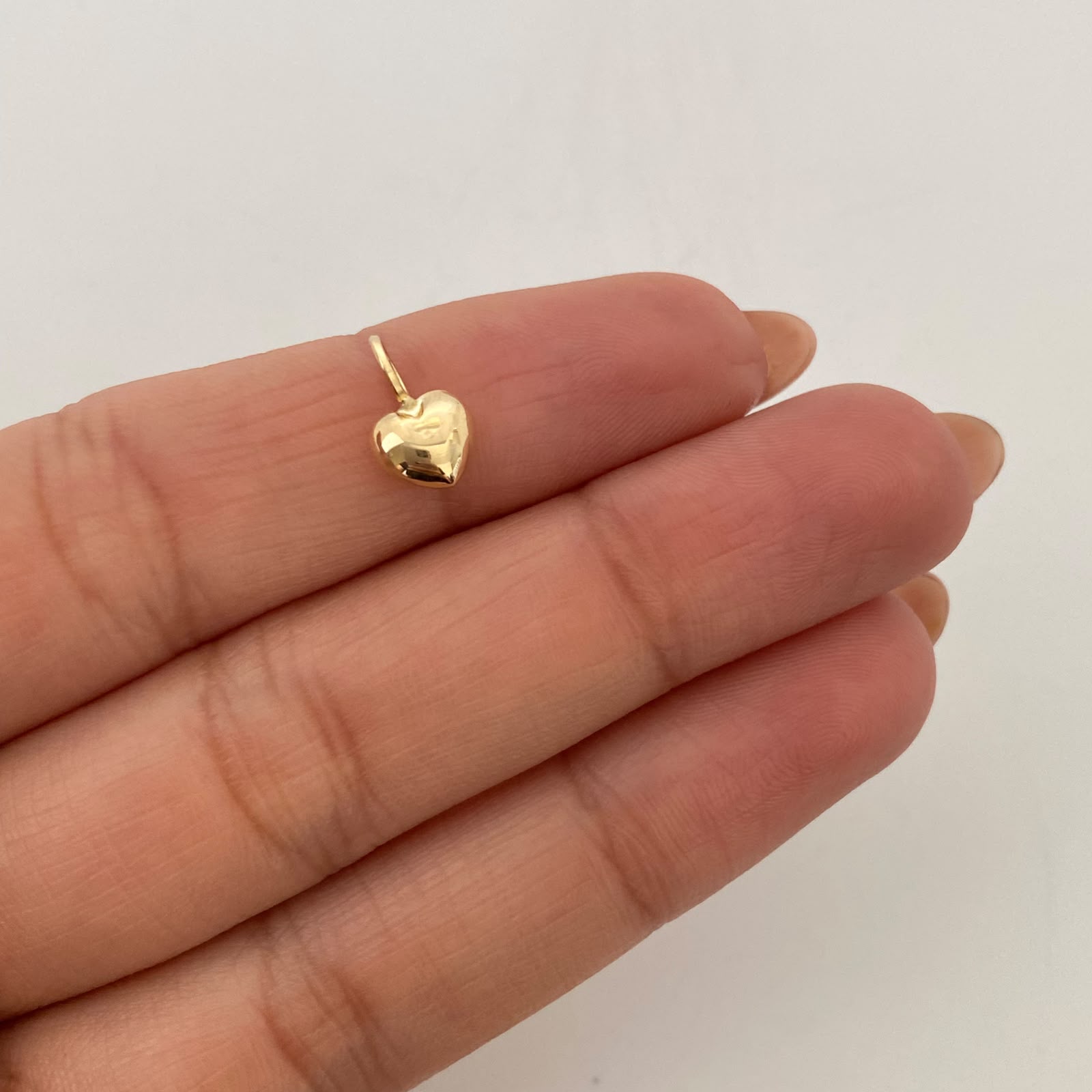 Dije Corazon Inflado Oro amarillo 18k 0,3 Gr / 6,7 mm / 1 Cm