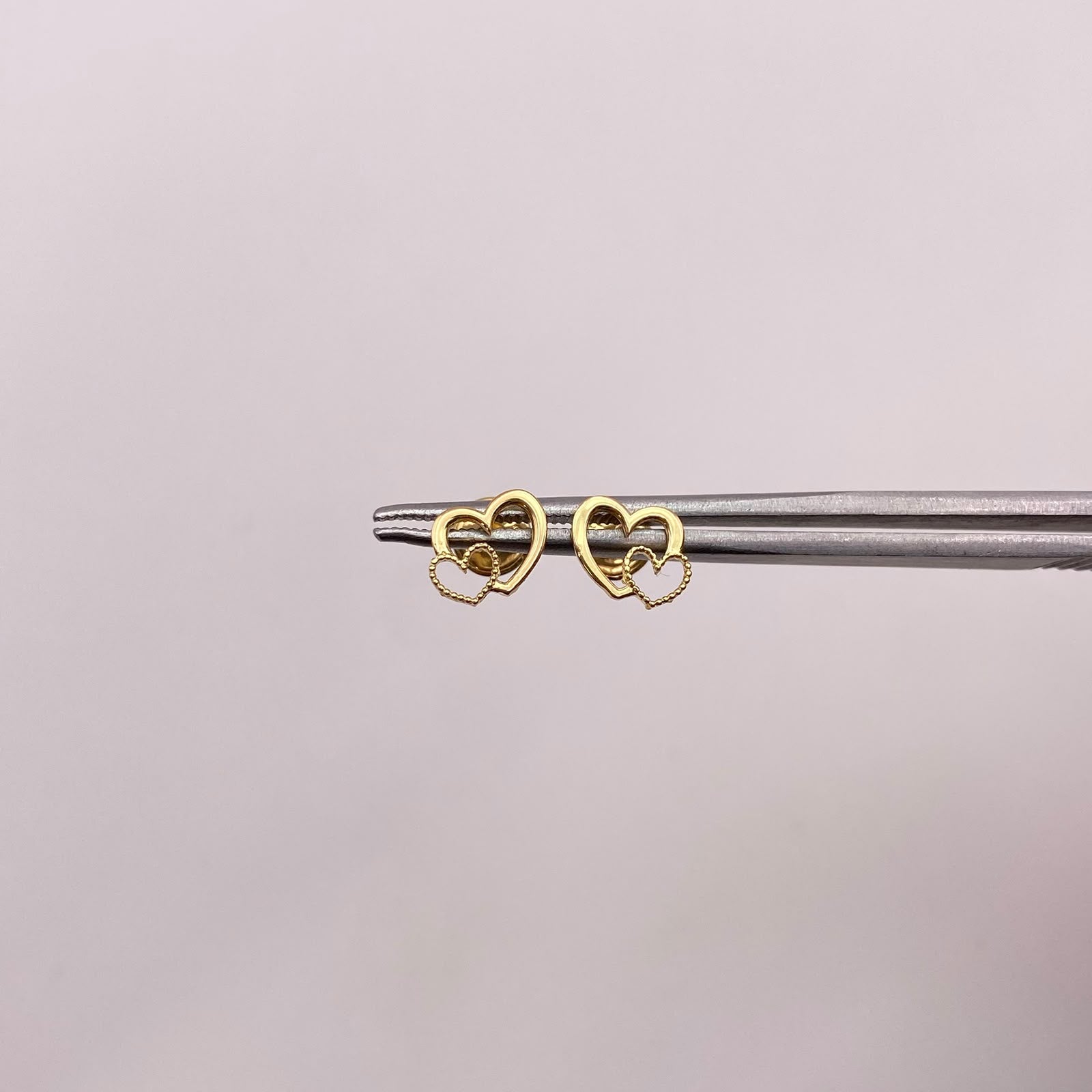 Topos Doble corazon Oro amarillo 18k 0,7 Gr / 7,4 mm