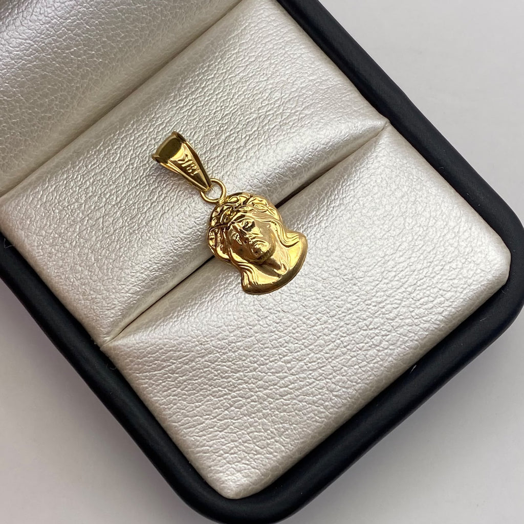 Dije rostro cristo Oro amarillo 18k 0,54 Gr / 7,9 mm / 2 Cm