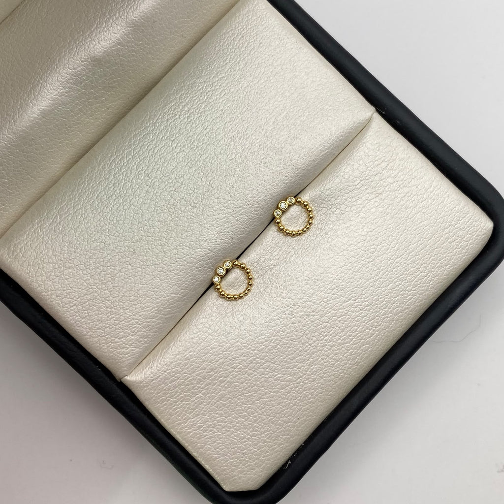 Topos Circulo tres circones blancos Oro amarillo 18k 0,7 Gr / 6,7 mm