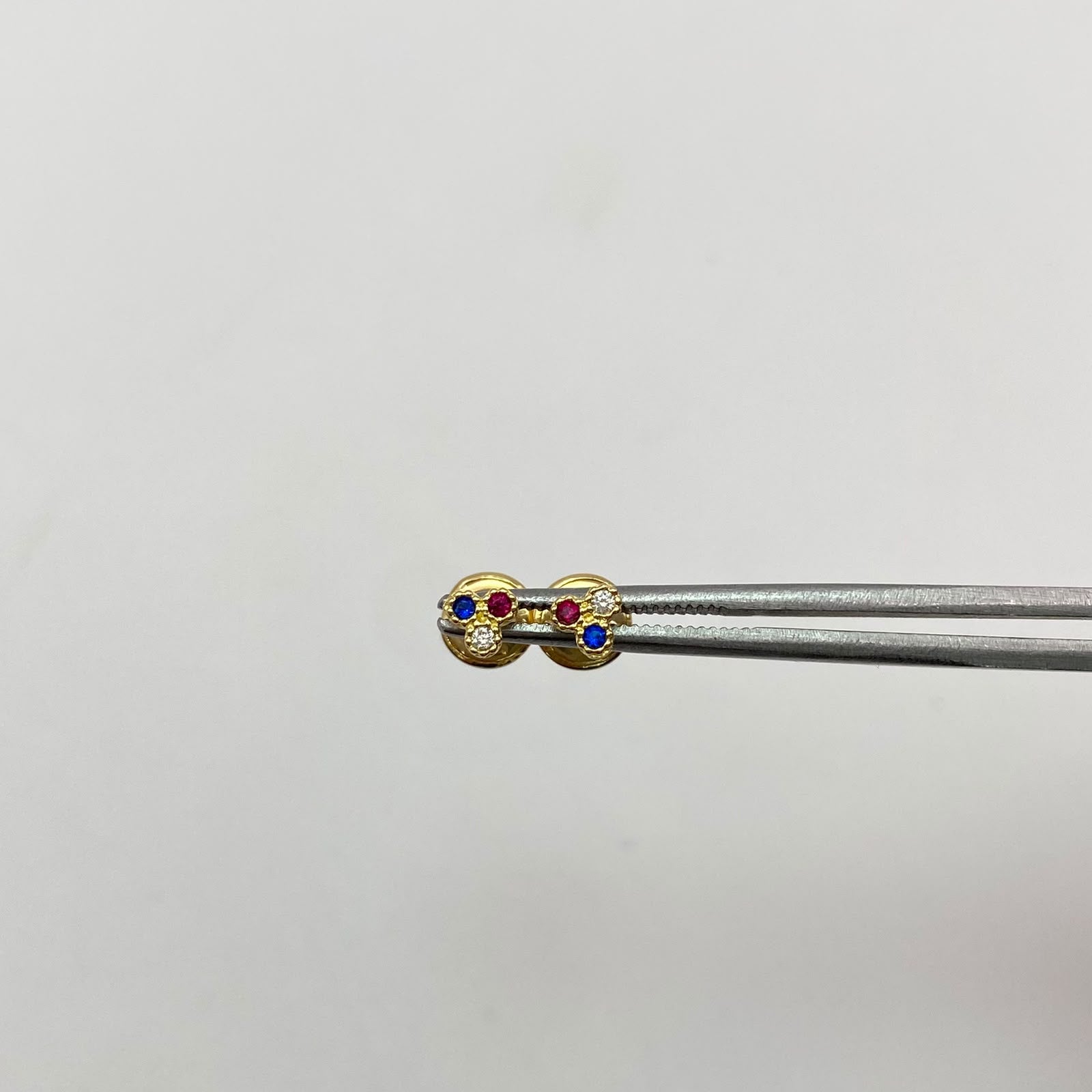 Topos tre circones multicolor Oro amarillo 18k 0,55 Gr / 4 mm