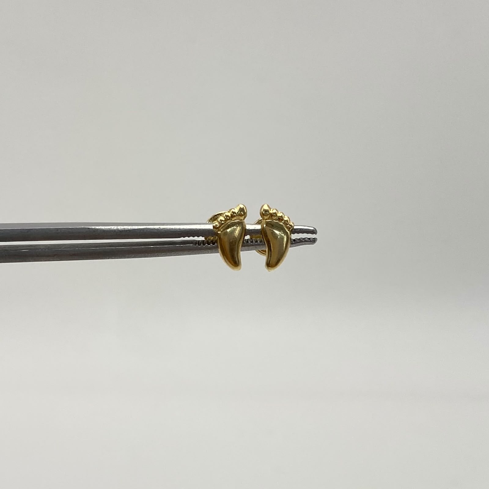 Topos pie Oro amarillo 18k 0,55 Gr / 3,9 mm
