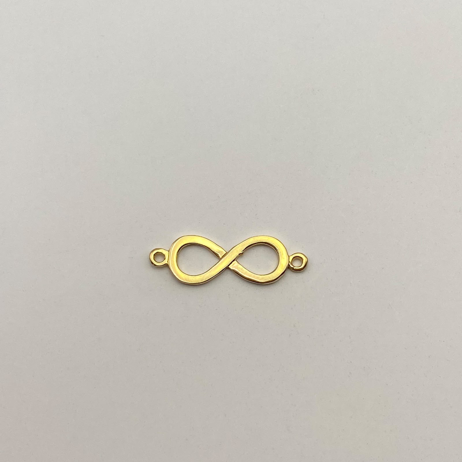 Herraje Infinito liso Oro amarillo 18k 1,05 Gr / 2,4 Cm