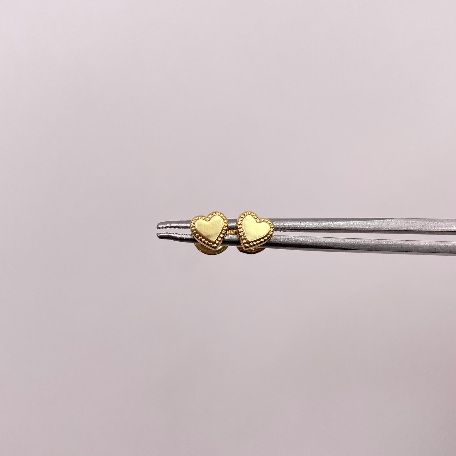 Topos Corazon centro liso Oro amarillo 18k 0,55 Gr / 5,1 mm