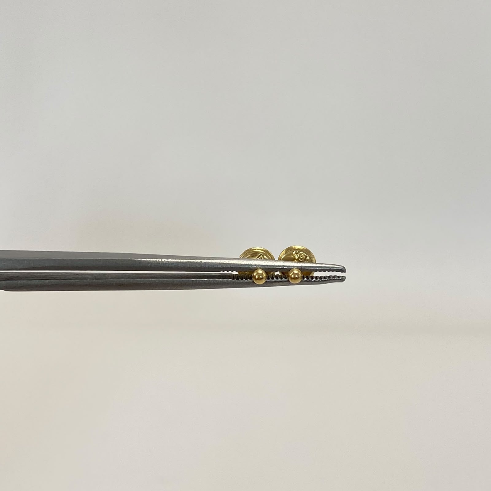 Topos bola lisa  Oro amarillo 18k 0,35 Gr / 2 mm