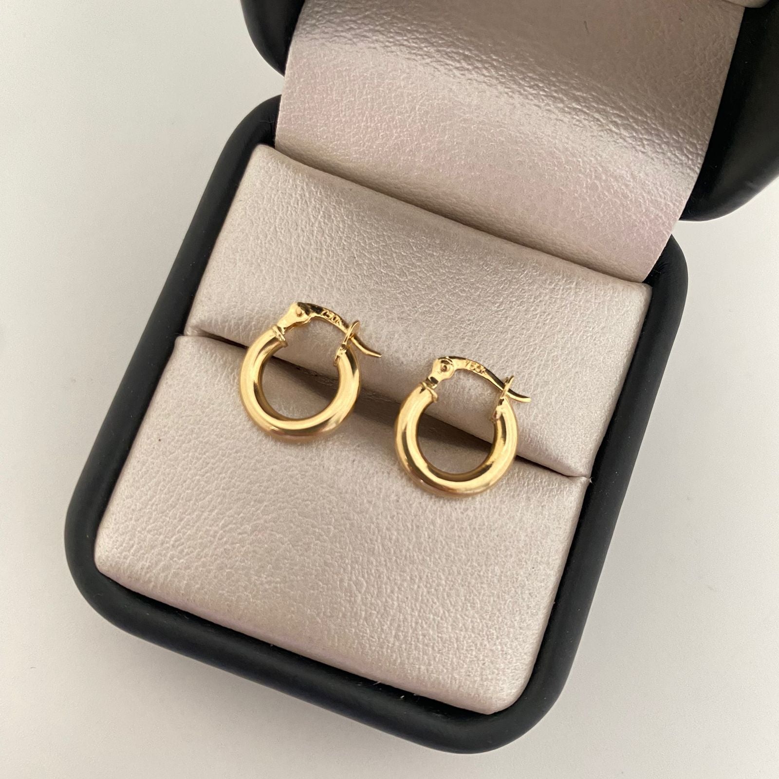 Candonga lisa troquelada Oro amarillo 18k 1,15 Gr / 1,5 Cm