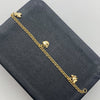 Tobillera aro seguido dijes Oro amarillo 18k 3,70 Gr / 2,25 mm / 24,5 Cm Broche 0,40