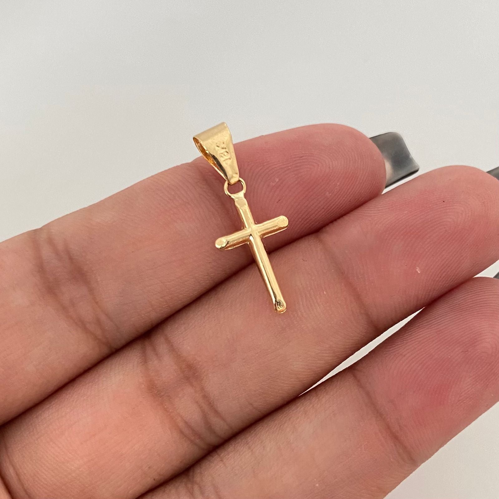 Dije cruz puntas biseladas Oro amarillo 18k 0,45 Gr / 2,4 Cm