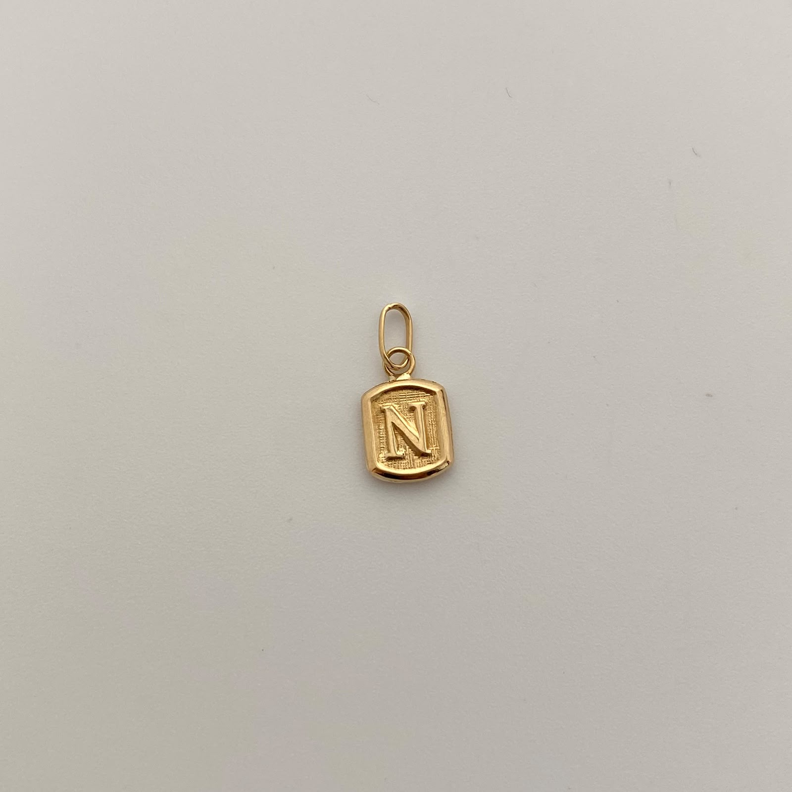 Dije Placa N Oro amarillo 18k 0,35 Gr / 7 mm / 1,5 Cm