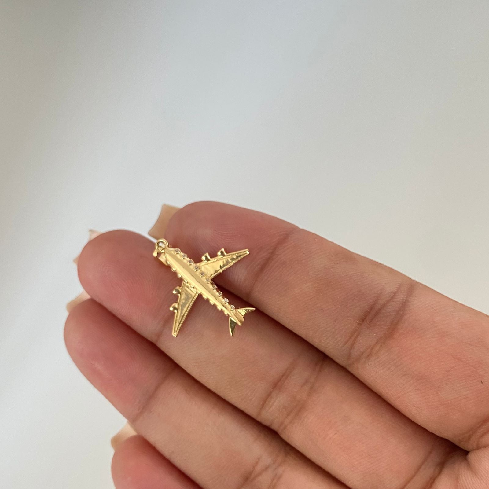 Dije avion casting Oro amarillo 18k 1,25 Gr / 2,5 Cm