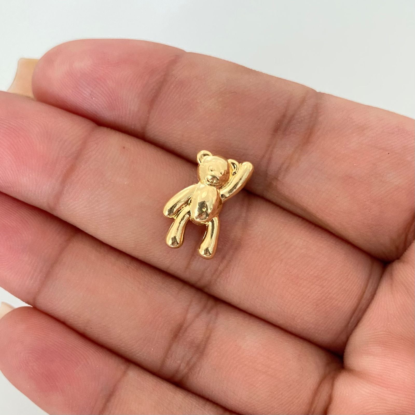 Dije oso mano alzada Oro amarillo 18k 0,95 Gr / 2,5 Cm