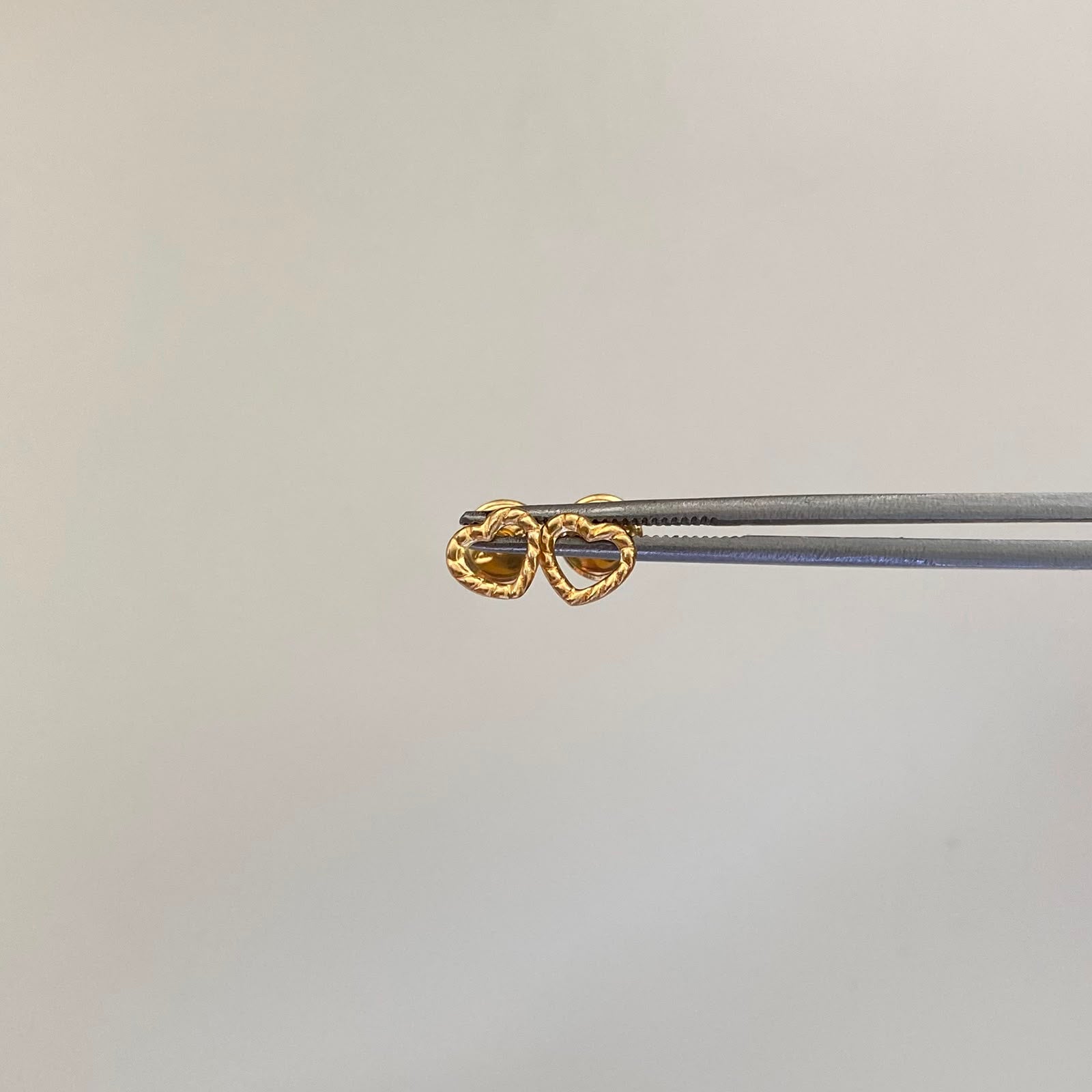 Topos Corazon Silueta Entorchado Oro amarillo 18k 0,45 Gr / 6 mm