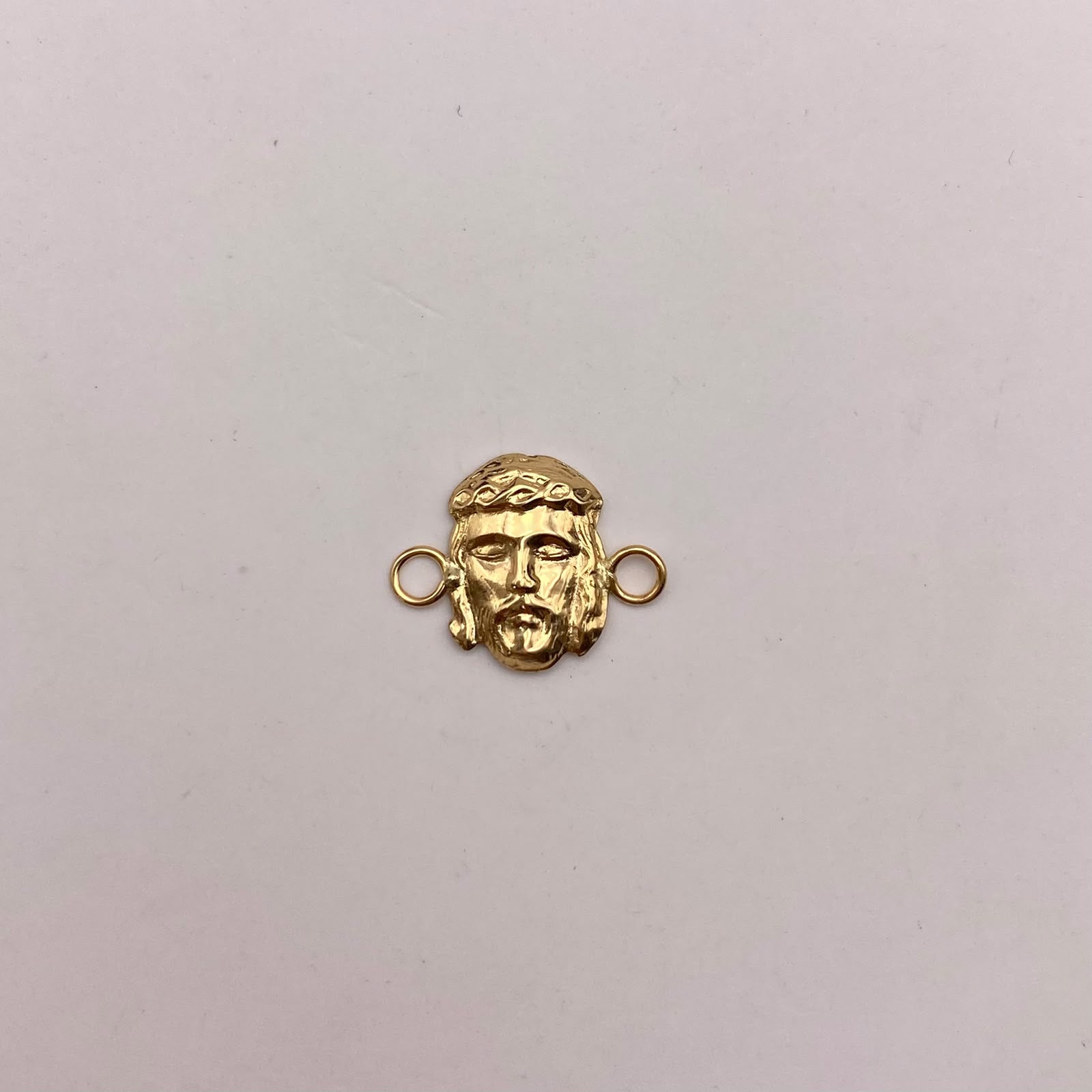 Herraje rostro jesus Oro amarillo 18k 0,45 Gr / 2 Cm