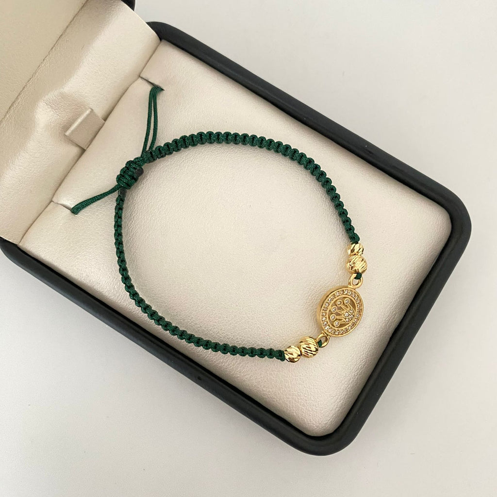 Pulsera tejida con herraje rx y bolas diamantadas 4mm y 3mm Oro amarillo 18k 2,25 Gr