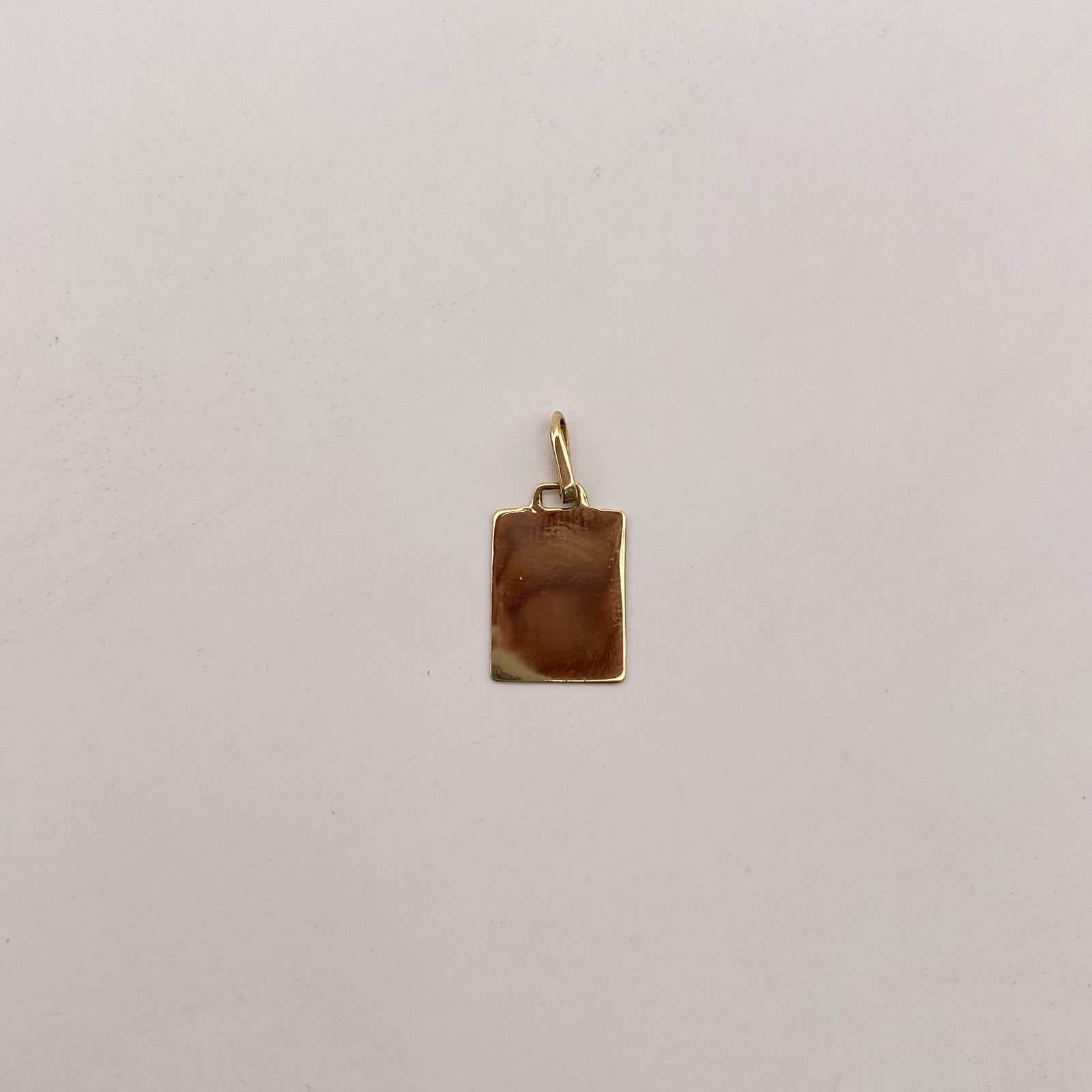Dije Placa lisa Oro amarillo 18k 0,65 Gr / 9,9 mm / 2 Cm