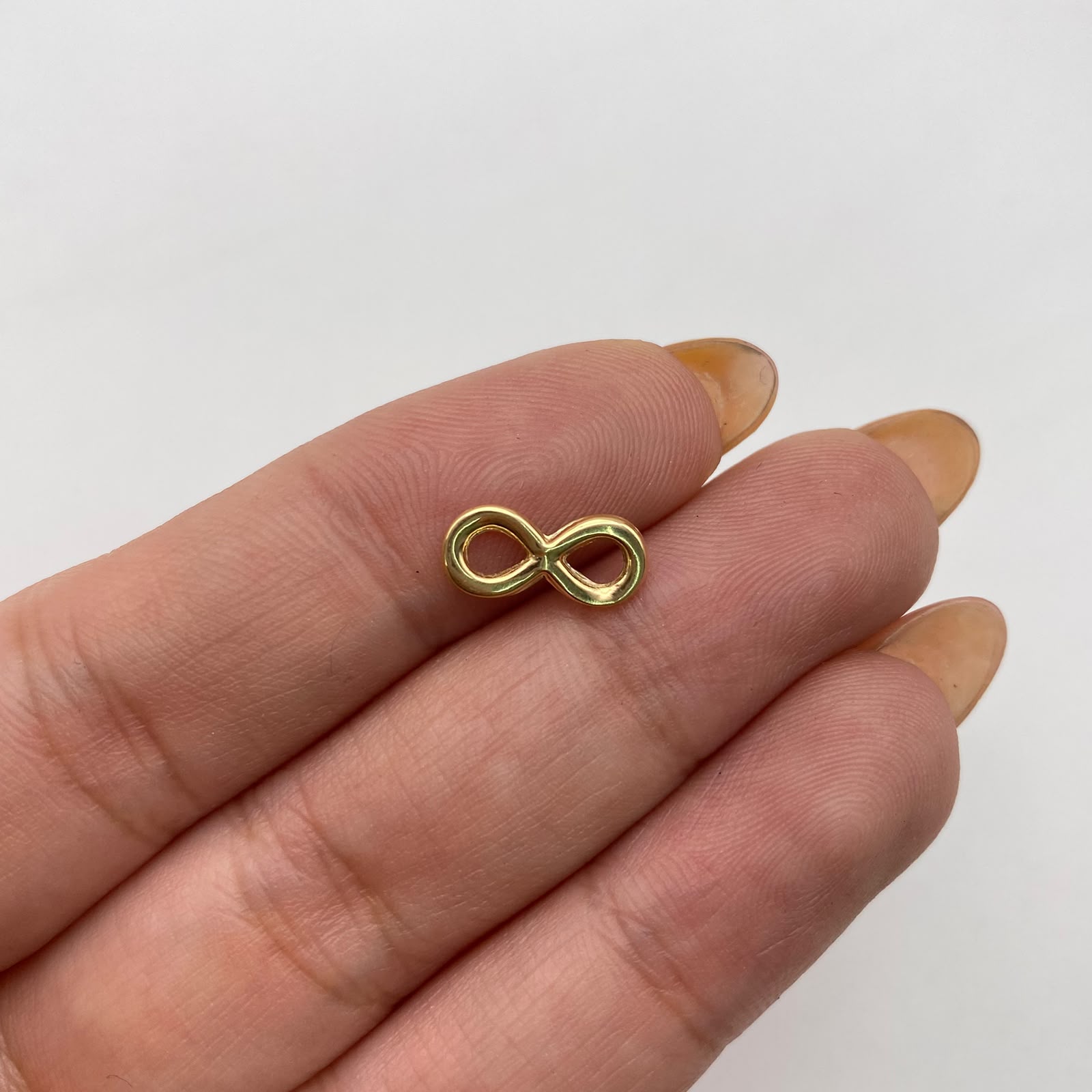 Herraje infinito Oro amarillo 18k 0,45 Gr / 1,5 Cm