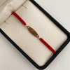 Pulsera tejida con placa ovalada y balines diamantados 4mm  Oro amarillo 18k 0,8 Gr