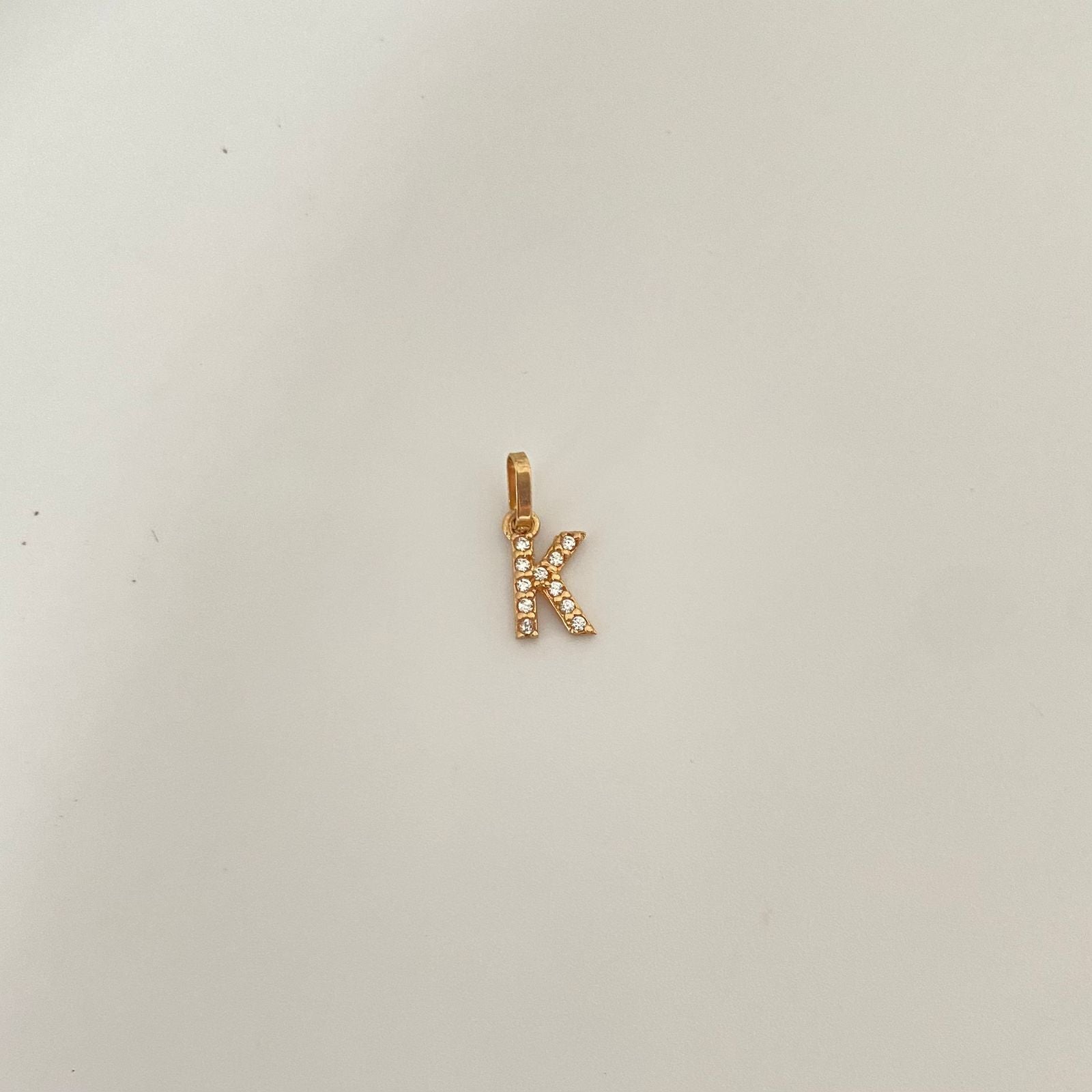 Dije letra K casting Oro amarillo 18k 0,5 Gr / 1,5 Cm