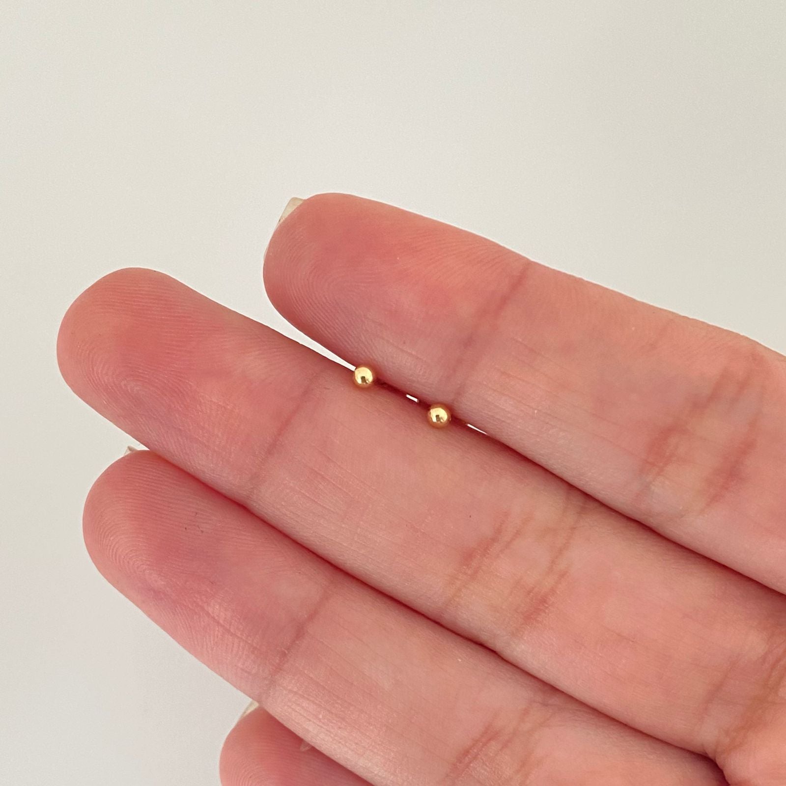 Topos bola lisa Oro amarillo 18k 0,45 Gr / 2,0 mm