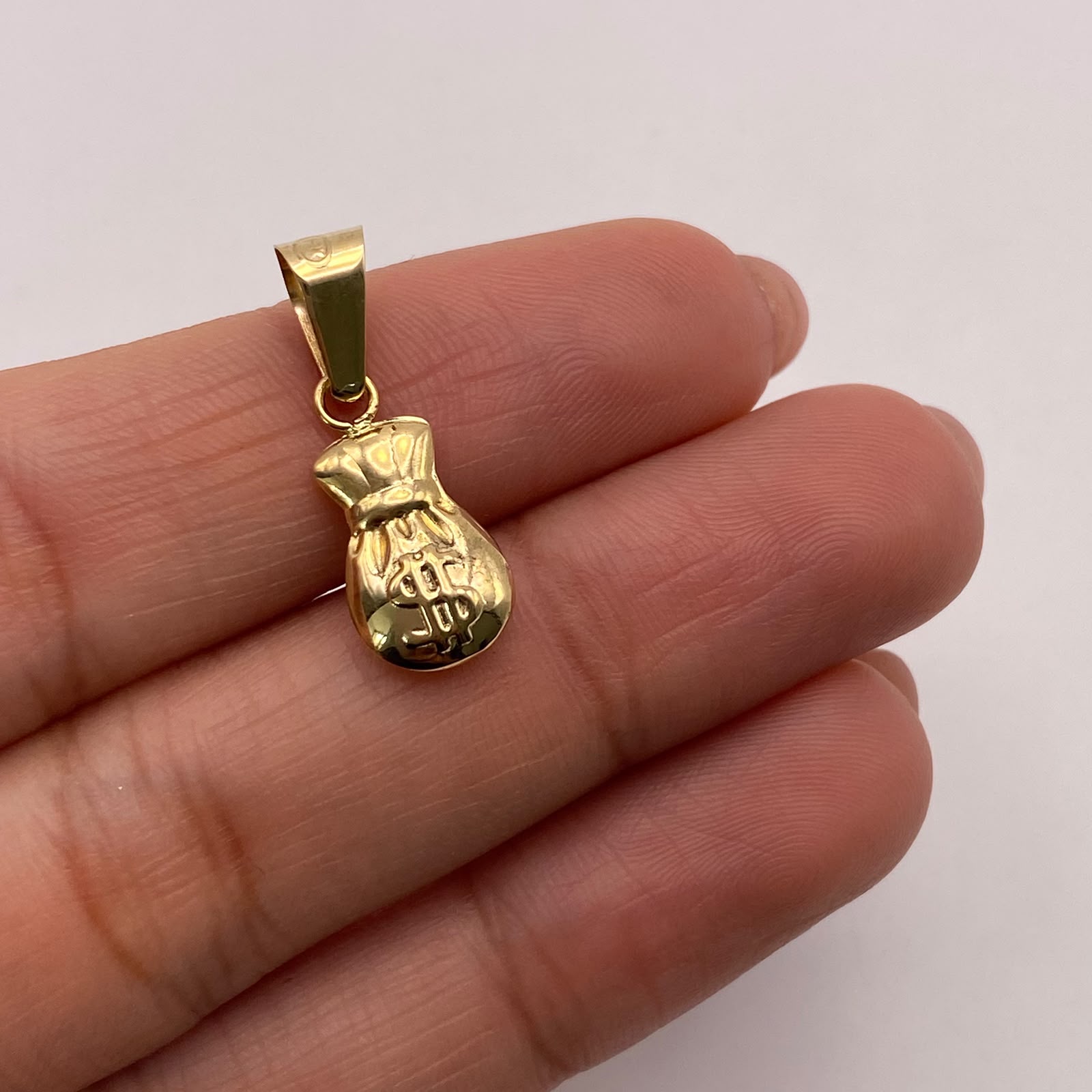 Dije Bolsa de valores Oro amarillo 18k 0,71 Gr / 8,2 mm / 2,3 Cm