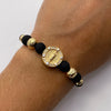 Pulsera tejida Herraje tambor virgen circones blancos bolas diamantadas 8mm,6mm y 5mm Oro amarillo y Oro blanco 18k 4 Gr
