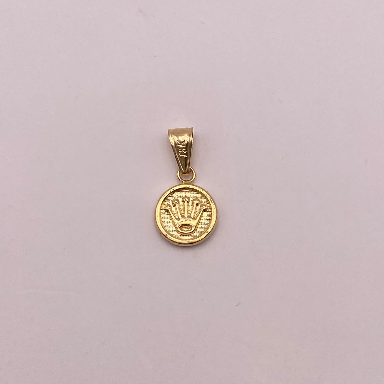 Dije Corona rx Oro amarillo 18k 0,63 Gr / 10,1 mm / 2 Cm